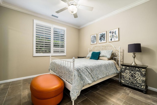 bedroom with ceiling fan and ornamental molding