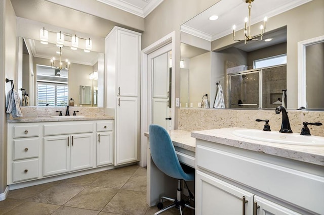 bathroom with a shower with shower door, tile patterned floors, a chandelier, crown molding, and vanity