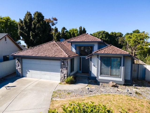 view of front of property featuring a garage