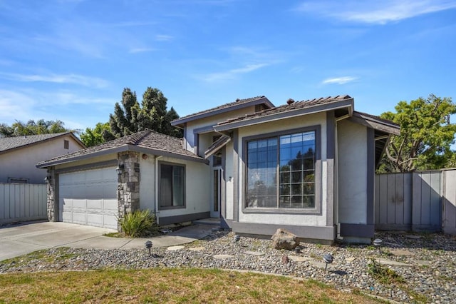 view of front of home featuring a garage