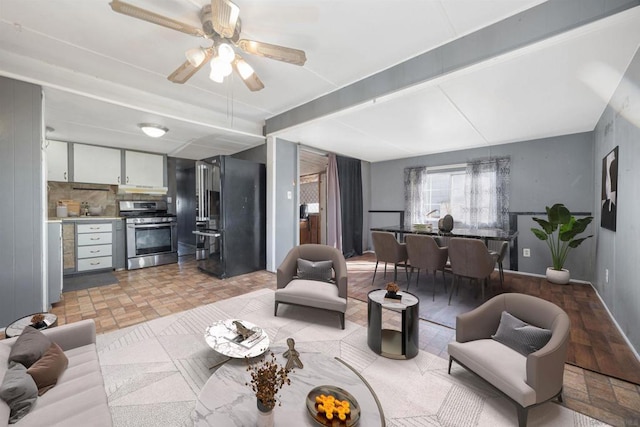 living room featuring ceiling fan