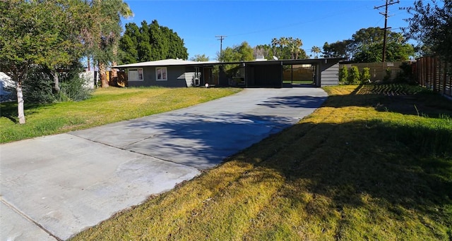 ranch-style house with a front lawn and a carport