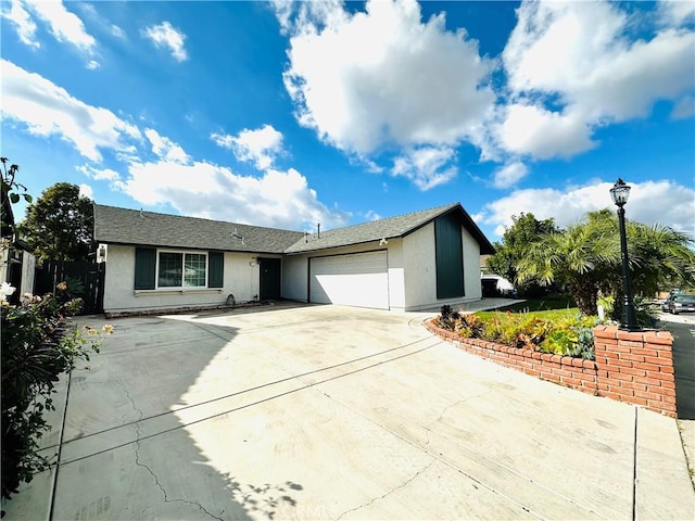 ranch-style home featuring a garage