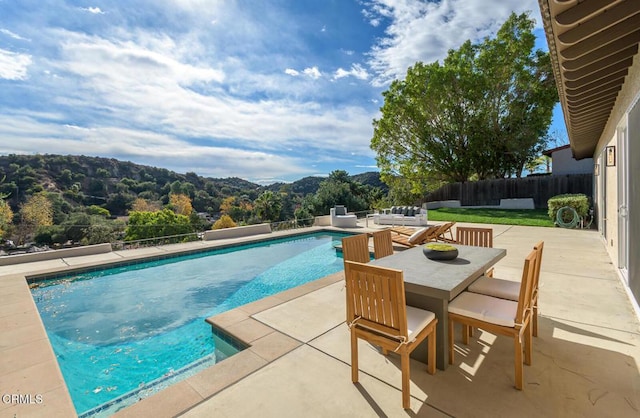 view of pool with a patio area and outdoor lounge area