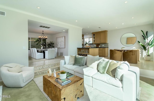 living room featuring an inviting chandelier