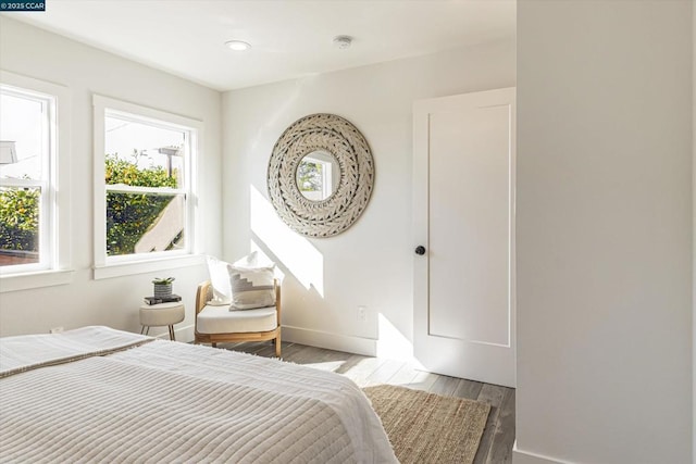 bedroom with light hardwood / wood-style floors