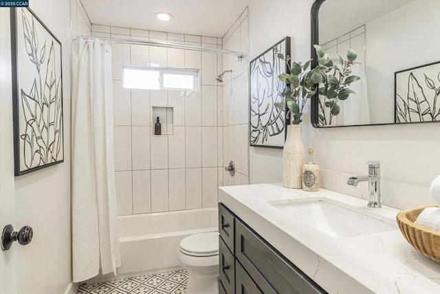 full bathroom with toilet, vanity, tile patterned flooring, and shower / bath combo