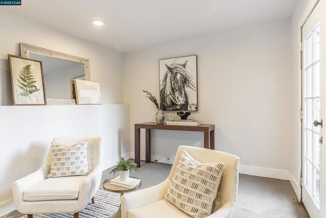 sitting room with concrete floors