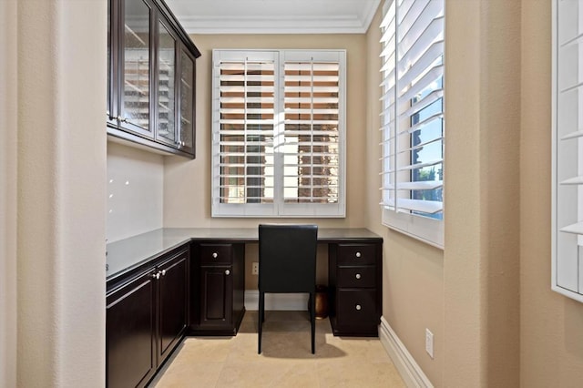 tiled office with built in desk and ornamental molding