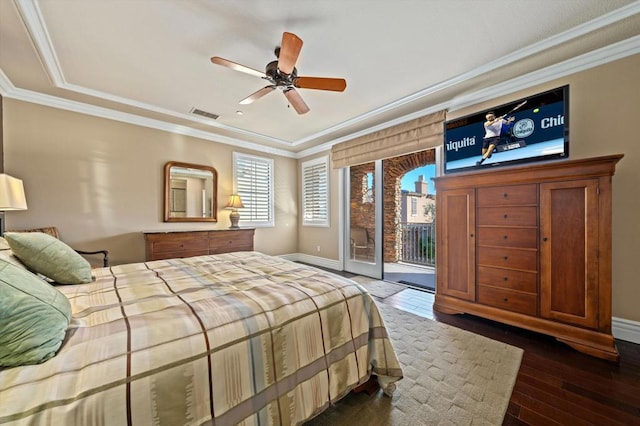 bedroom featuring dark hardwood / wood-style flooring, crown molding, access to outside, and ceiling fan