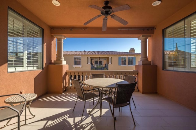 balcony featuring ceiling fan