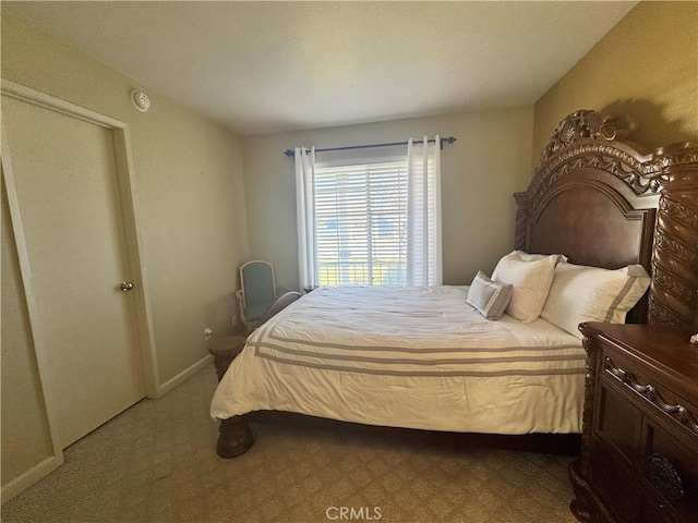 bedroom with light carpet