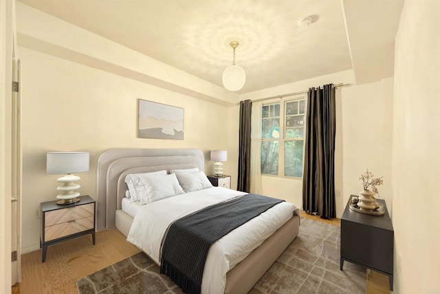 bedroom featuring wood-type flooring