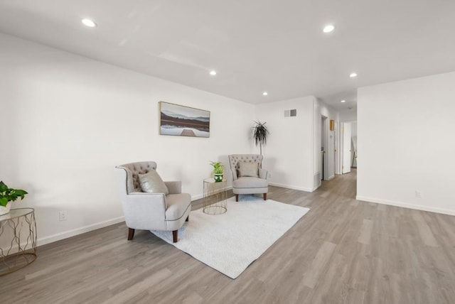 living area featuring light hardwood / wood-style floors