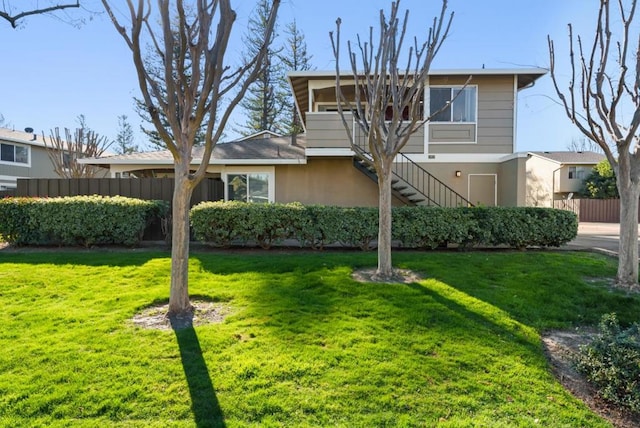 view of front of property with a front lawn