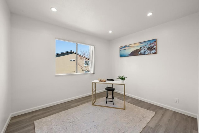 office area featuring dark wood-type flooring