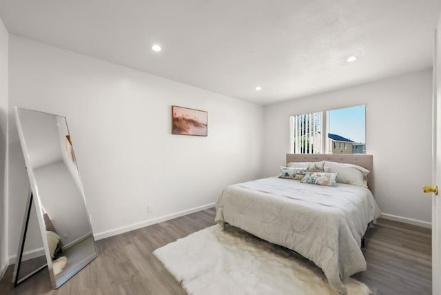 bedroom featuring hardwood / wood-style floors