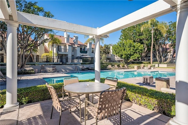 view of patio / terrace featuring a community pool