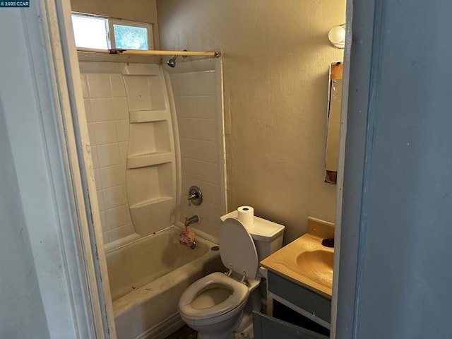 full bathroom featuring vanity, washtub / shower combination, and toilet