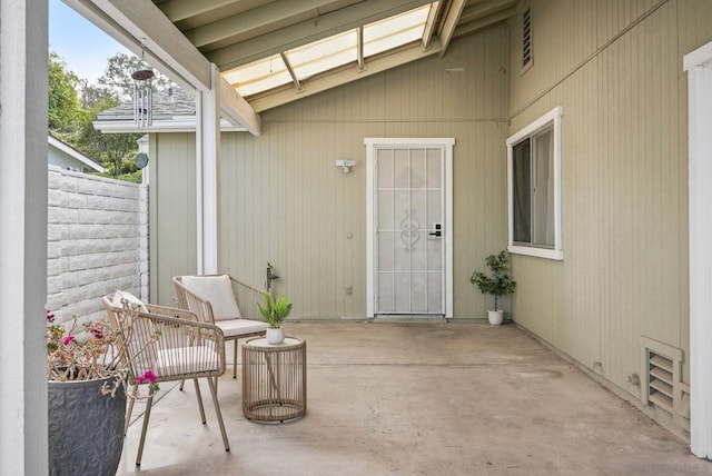 property entrance with a patio area