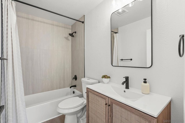 full bathroom with toilet, shower / bath combination with curtain, and vanity