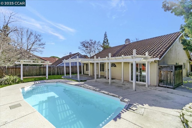 view of pool featuring a pergola and a patio area