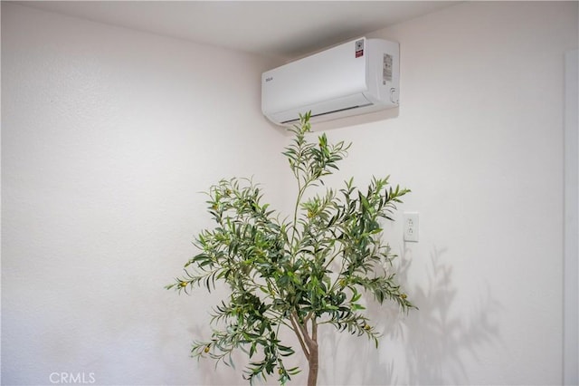 details featuring a wall mounted AC