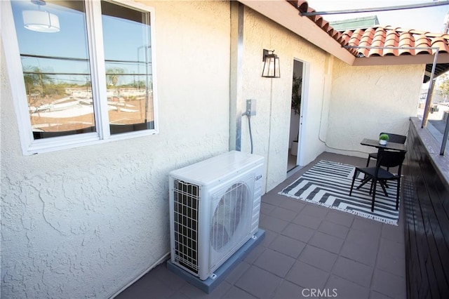 exterior space with ac unit