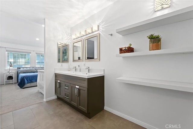 bathroom with vanity and tile patterned floors