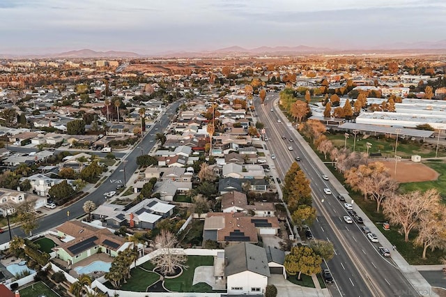 aerial view at dusk with a mountain view