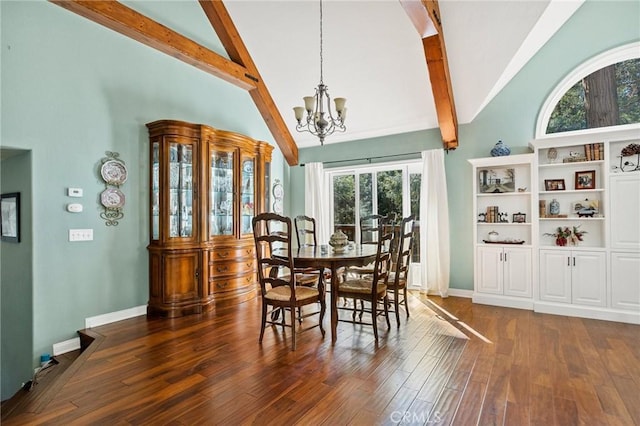 dining area with beam ceiling, dark hardwood / wood-style floors, a notable chandelier, and high vaulted ceiling