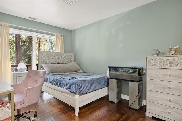 bedroom featuring dark wood-type flooring