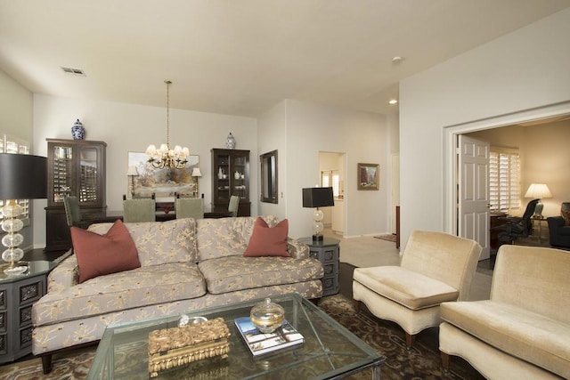 living room featuring a chandelier