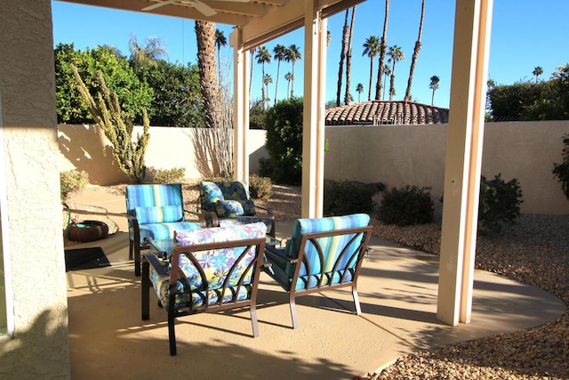 view of patio with ceiling fan