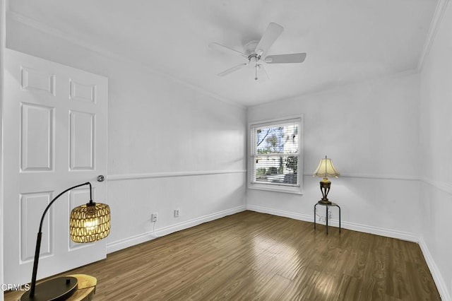 unfurnished room featuring ceiling fan, ornamental molding, and hardwood / wood-style flooring