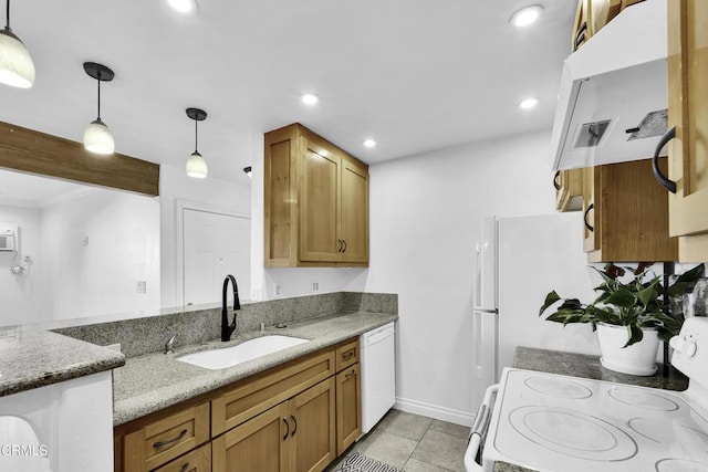 kitchen with sink, white appliances, beamed ceiling, hanging light fixtures, and light stone countertops