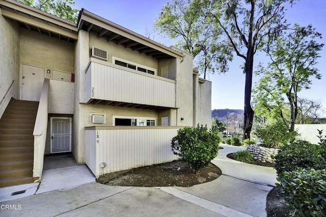 view of home's exterior featuring a balcony