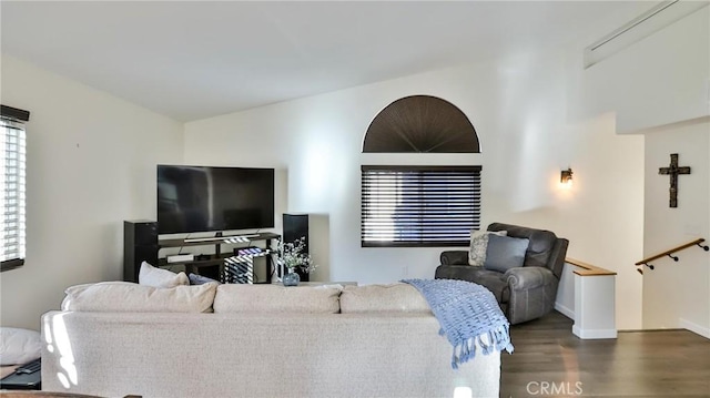 living room featuring dark wood-type flooring