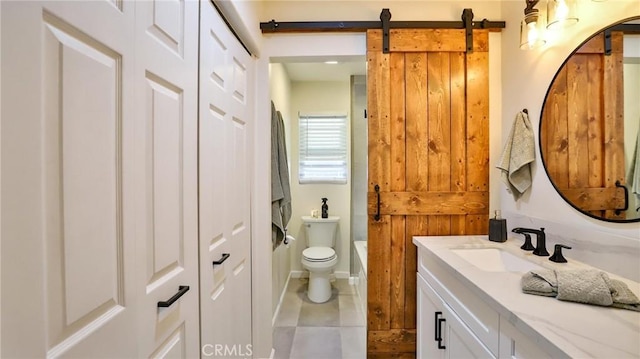 bathroom with toilet and vanity