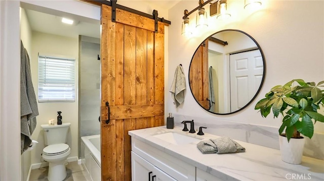 bathroom featuring toilet, a tub, and vanity