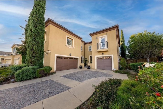 mediterranean / spanish-style home featuring a garage