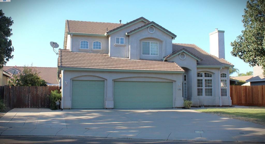 view of property featuring a garage