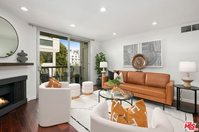 living room featuring dark hardwood / wood-style flooring