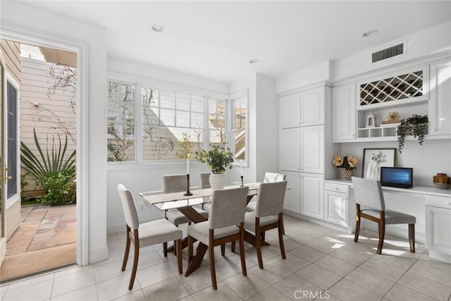 dining room with light tile patterned floors