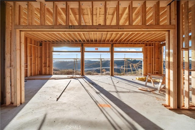 miscellaneous room featuring a mountain view