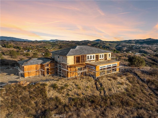 view of front of property with a mountain view