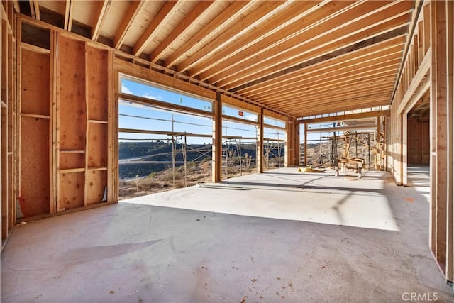 miscellaneous room with concrete floors and a wealth of natural light