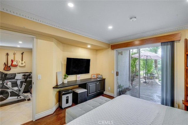 bedroom featuring crown molding, access to outside, and wood-type flooring