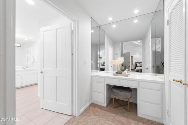 bathroom with vanity and tile patterned floors