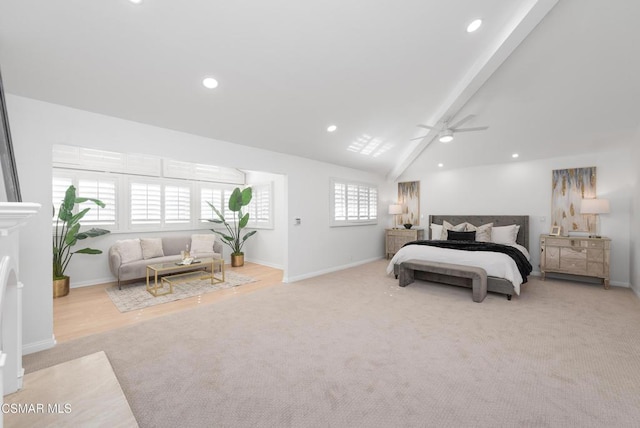 carpeted bedroom featuring ceiling fan, multiple windows, and vaulted ceiling with beams